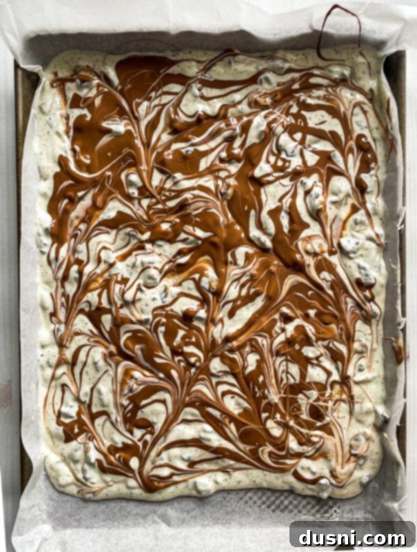 Oreo Bark Recipe sheet of almond bark with milk chocolate