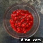 Holiday Cherry Pie Bliss 12 Adding the Cherry Pie filling to the Jello.