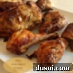 Golden and Juicy Oven Baked Chicken 2 Easy Oven Baked Chicken on a white platter with text "Easy oven baked chicken"