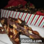 Rich Caramel Pecan Bark 2 Close up of Turtle bark on a white plate and a package full in the background