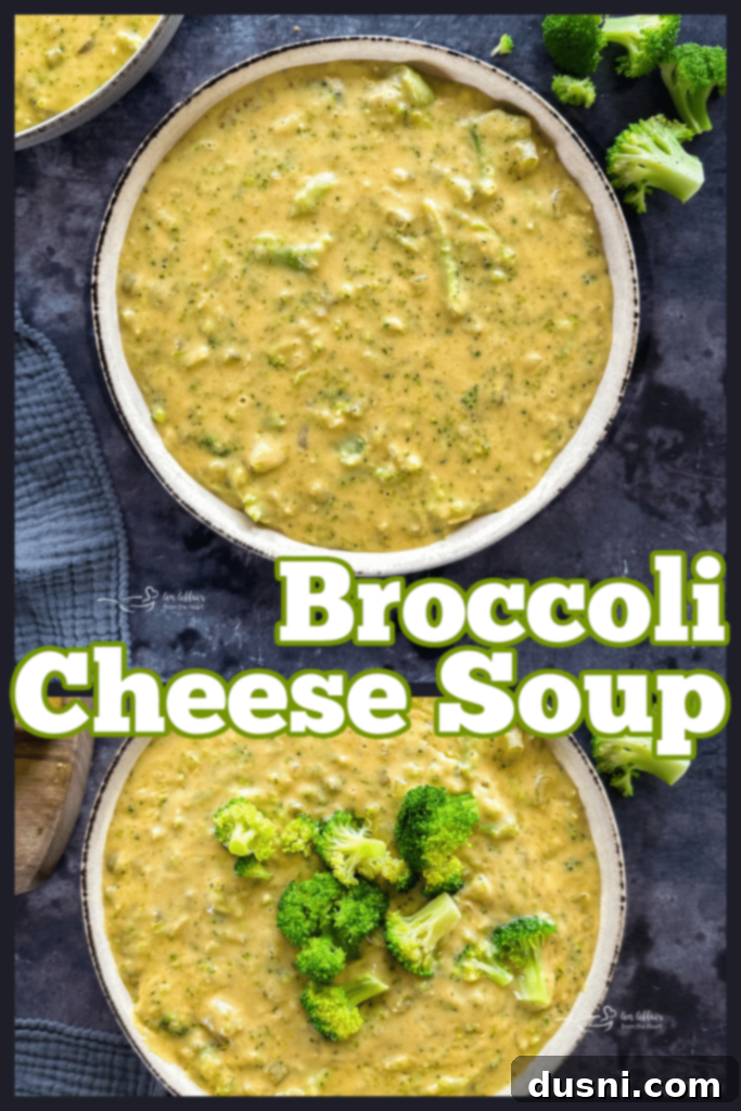 A slow cooker filled with creamy broccoli cheese soup, ready to be served.