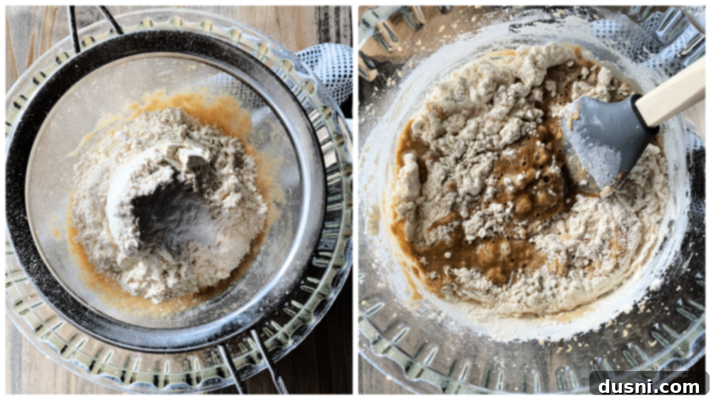Close-up of ingredients being mixed in a bowl for spiced raisin cookies, showing a fluffy batter.