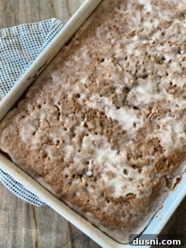 Freshly baked Iced Raisin Bars, generously frosted and ready to be served.