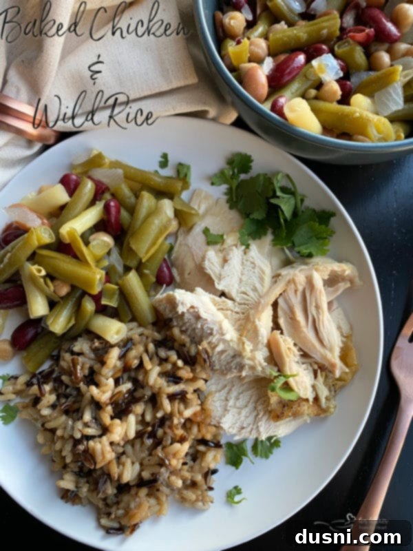 Effortless Wild Rice Stuffed Chicken 10 Baked chicken and wild rice, ready to be carved and served.