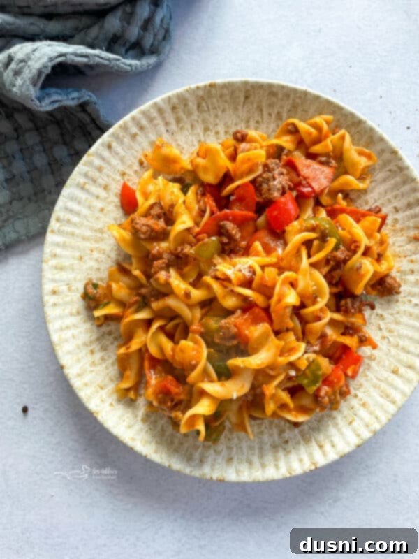 Delicious baked pizza pasta casserole with melted cheese and pepperoni