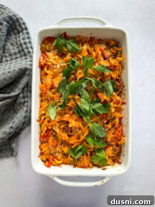 Baked pizza pasta casserole, golden and bubbly, fresh out of the oven