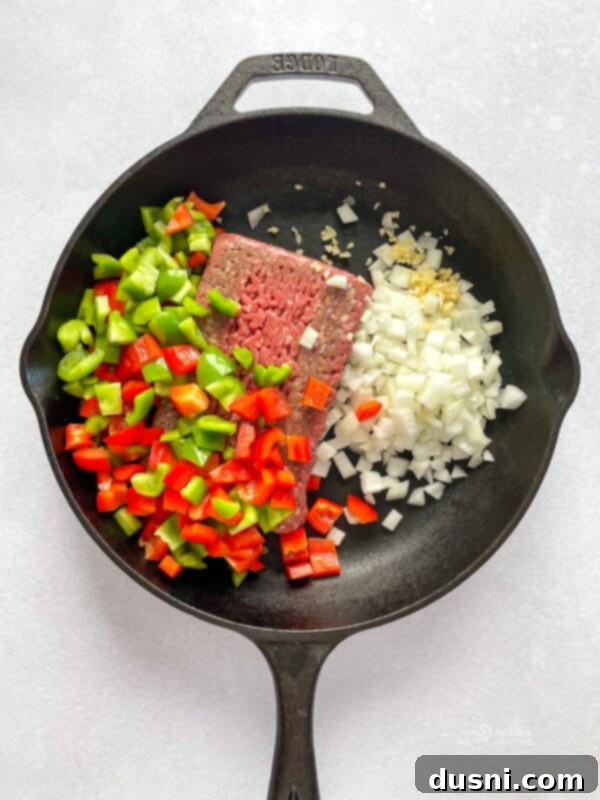 Cooked egg noodles in a pot, ready for the pizza pasta casserole