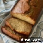 The Ultimate Banana Bread 10 overhead of The BEST Banana Bread on a white platter