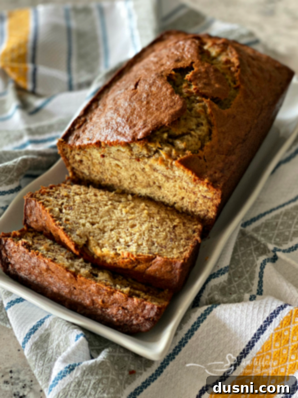 The Ultimate Banana Bread 3 A beautifully golden brown loaf of the ultimate homemade banana bread