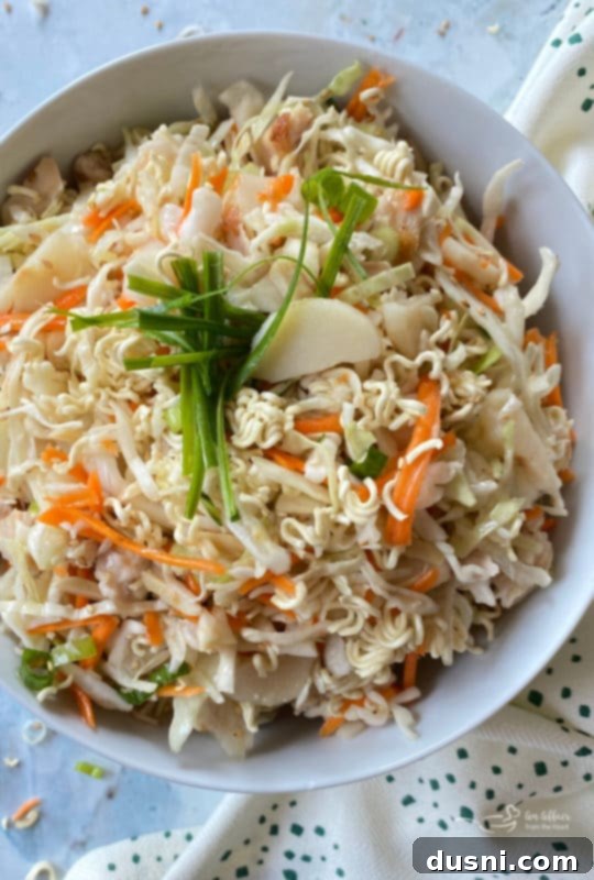Plated Chinese Chicken Salad with a sprinkle of sesame seeds