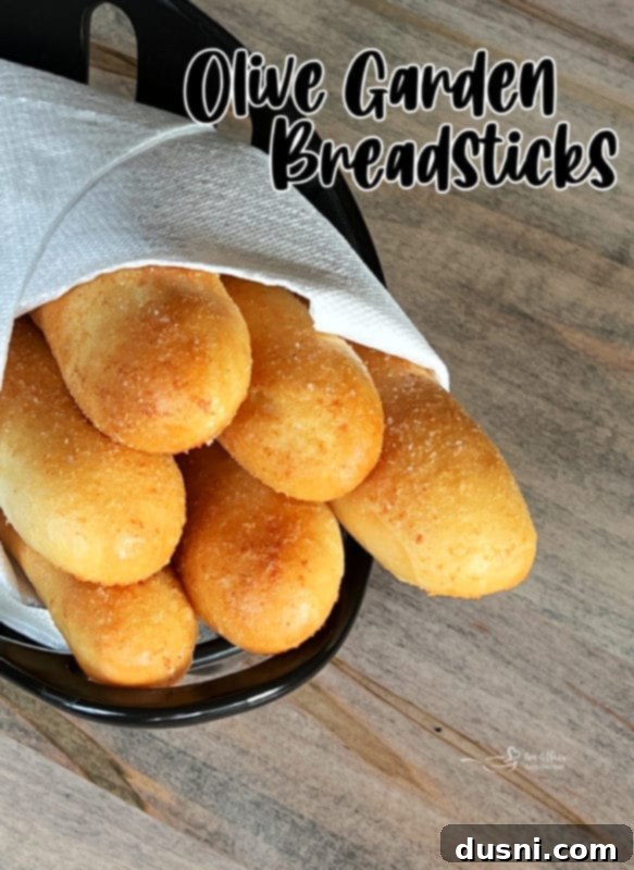 A fresh batch of Olive Garden Breadsticks, close up and ready to eat