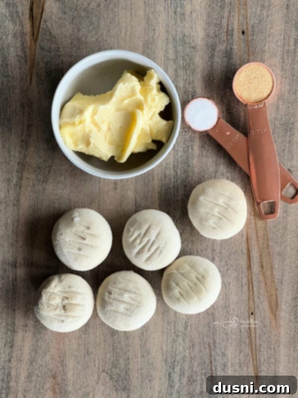 Ingredients for Olive Garden Breadsticks including frozen dough, butter, garlic powder, and sea salt