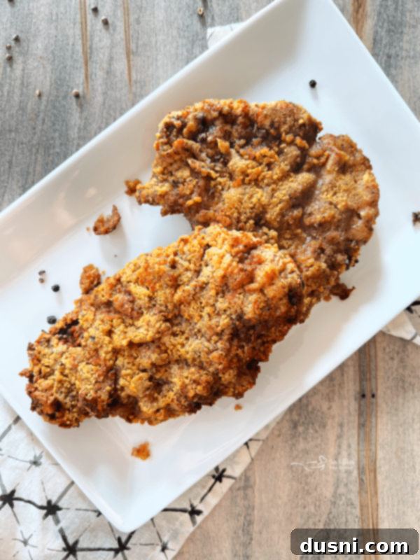 Air Fryer Chicken Fried Steak cooking in air fryer