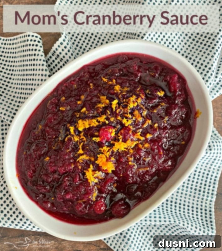 Mom's Homemade Cranberry Perfection 10 A festive close-up of Mom's homemade cranberry sauce, showcasing its vibrant color and texture in a holiday setting.