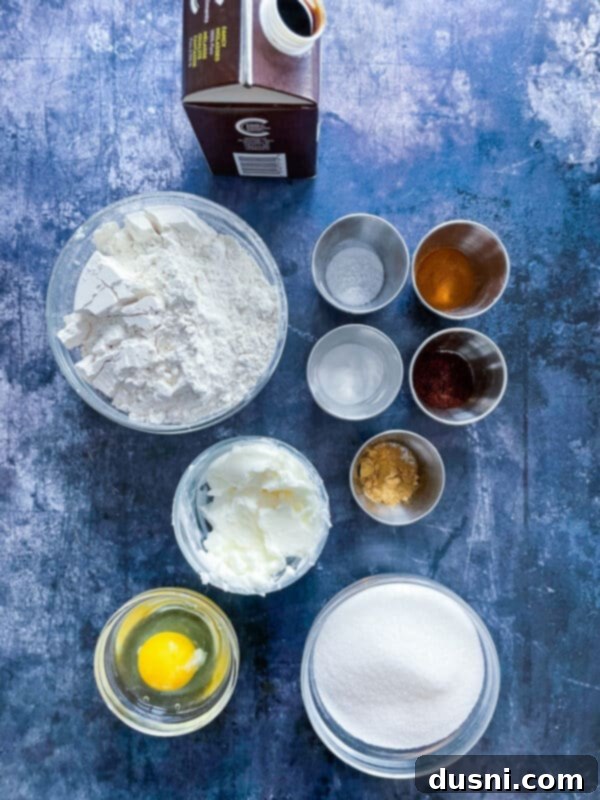 A close-up of unbaked Gingerdoodle cookie dough, showing the distinct light and dark swirls before rolling.