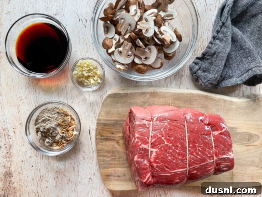 Mouthwatering Crock Pot French Dip Sandwiches 6 Assortment of French dip ingredients: raw beef, sliced mushrooms, soy sauce, garlic, and dry onion soup mix.