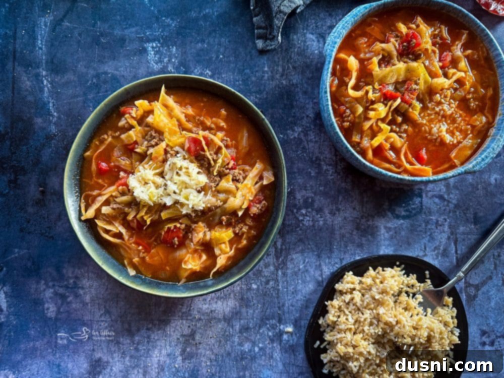 Classic Cabbage Roll Soup Made Two Ways 4 Cabbage Roll Soup served in a white bowl with a spoon