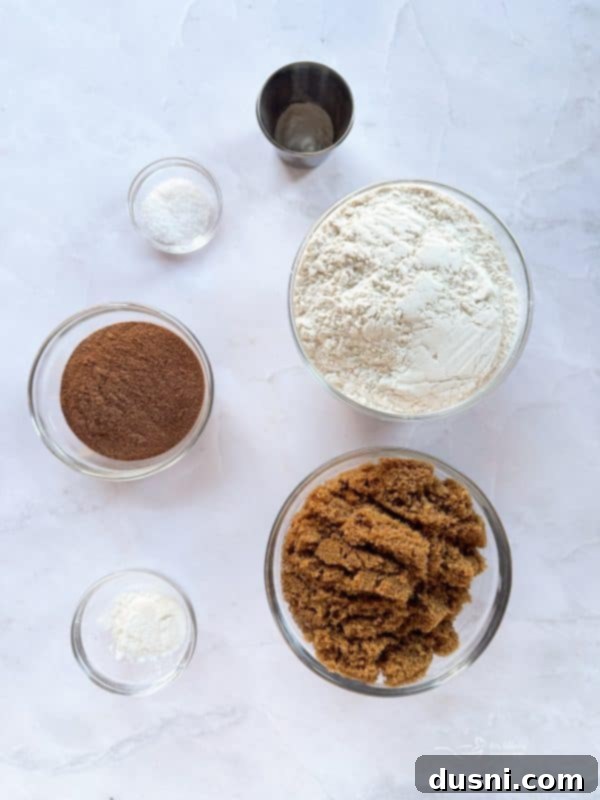 Malted Chocolate Chip Cookie dough balls scooped onto a baking sheet, ready for chilling and baking.