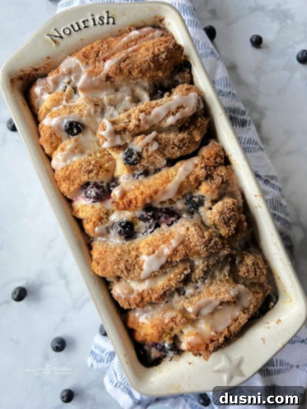 Warm Blueberry Lemon Pull-Apart Bread with lemon glaze.