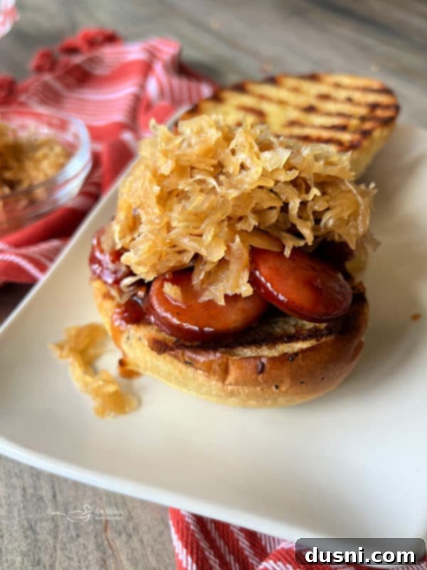 Smoky Sausage & Tangy Kraut Sandwiches 15 Topping BBQ smoked sausage sandwich with Frank's BBQ Kraut