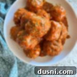 Savory Rice-Studded Meatballs 14 bowl of porcupine meatball with tomato sauce