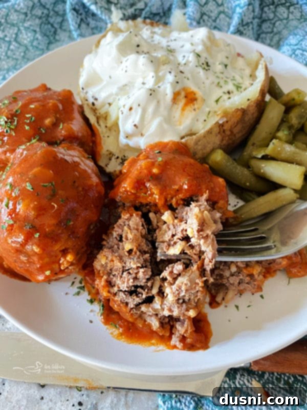 Savory Rice-Studded Meatballs 9 Porcupine meatball served with a baked potato and green beans