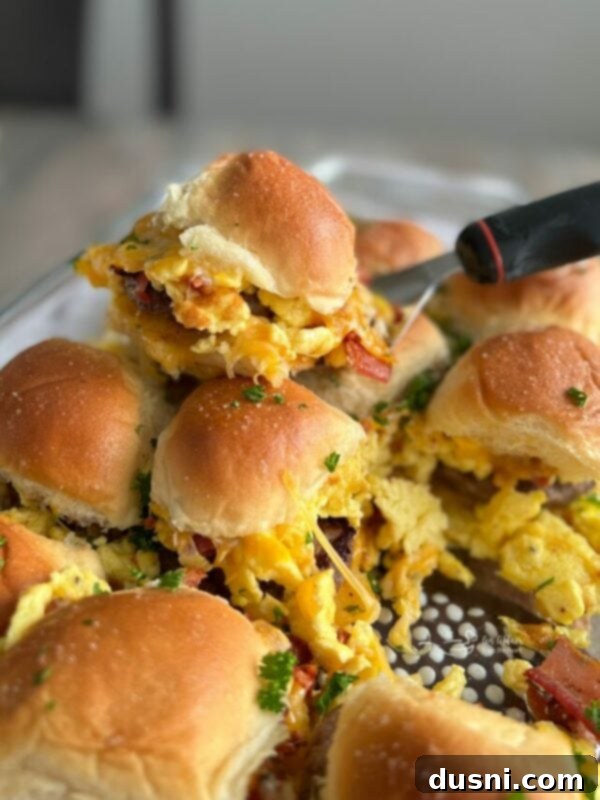Close-up view of savory sausage egg and cheese sliders, perfect for breakfast or brunch