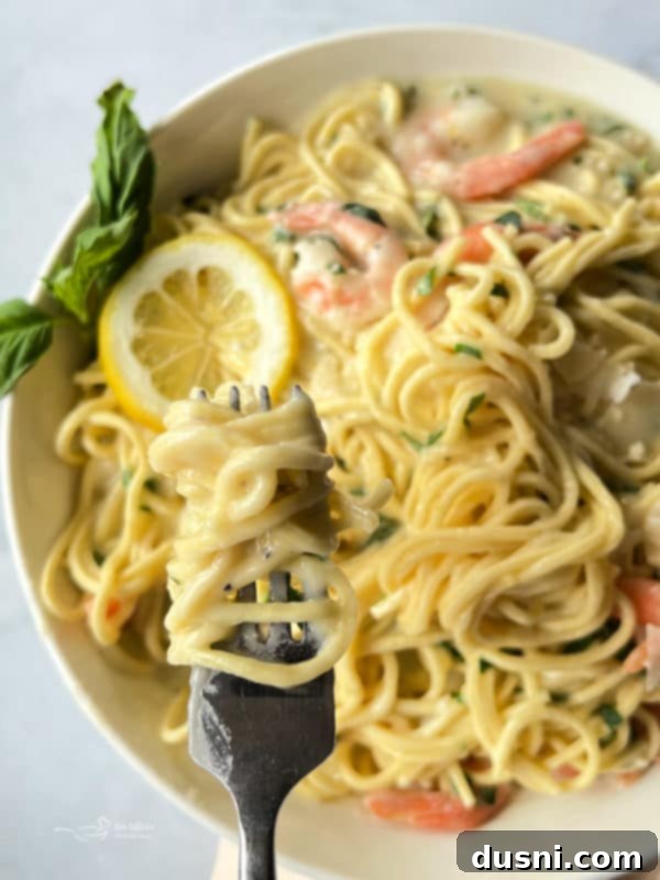 Bright Lemon Basil Creamy Shrimp Pasta 3 Fork Covered in Noodles