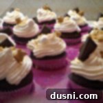 s'more cupcakes in a pink cupcake tray