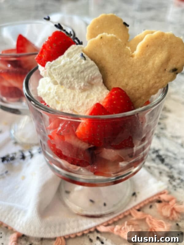 Lavender Shortbread and Lavender Strawberry Cream 21 A beautifully plated dessert of lavender shortbread, lavender-infused strawberries, and whipped cream, ready to be enjoyed.