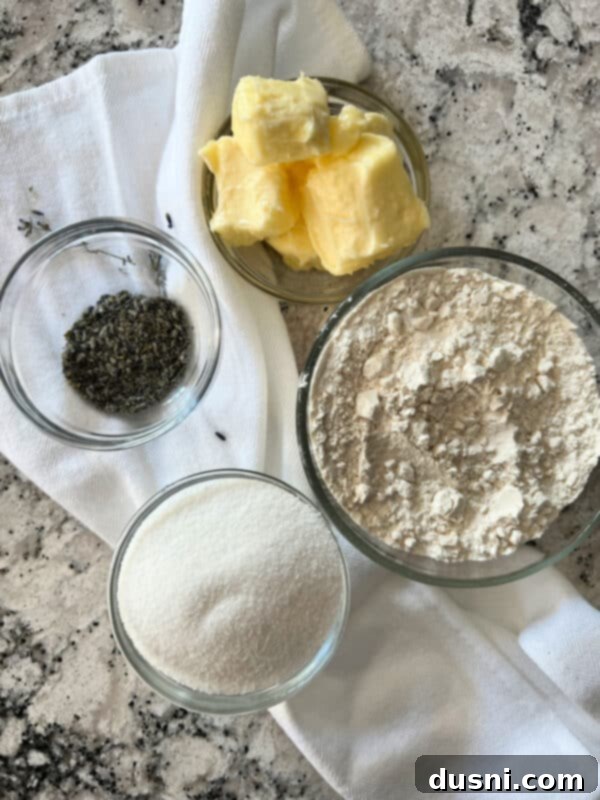 Lavender Shortbread and Lavender Strawberry Cream 7 Overhead shot of butter, sugar, flour, and dried lavender buds arranged neatly on a cutting board, ready for baking.