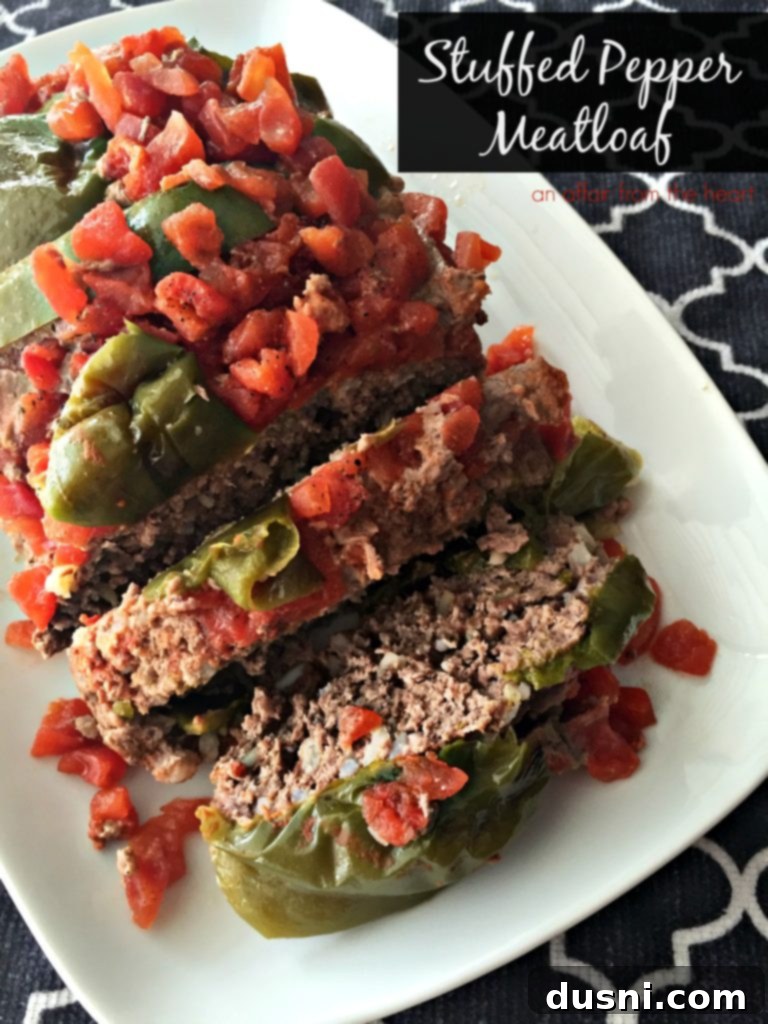 Bell Pepper Inspired Meatloaf 5 Sliced Stuffed Pepper Meatloaf with bell pepper rings on top
