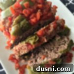 Bell Pepper Inspired Meatloaf 6 Overhead image of Stuffed Pepper Meatloaf on a white platter