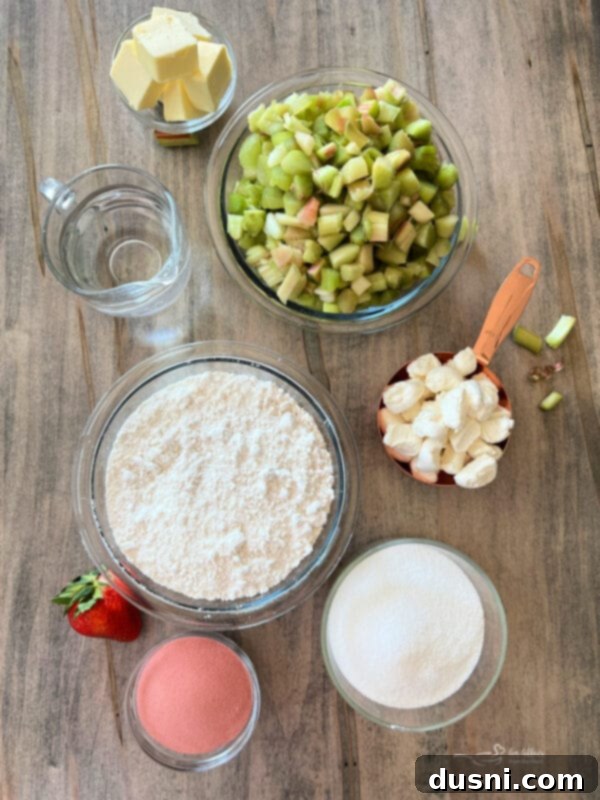Strawberry Rhubarb Bliss 5 Ingredients laid out for Strawberry Rhubarb Cobbler recipe
