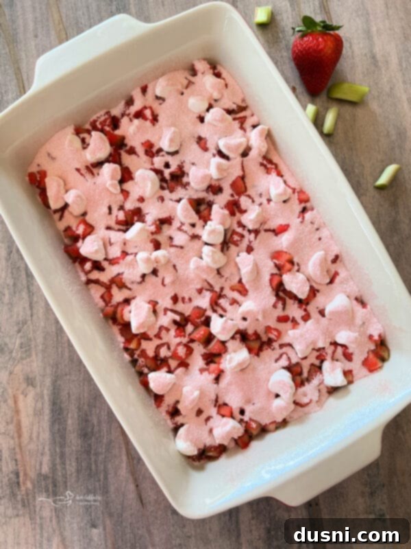 Strawberry Rhubarb Bliss 9 Blending cake mix and melted butter for the cobbler topping