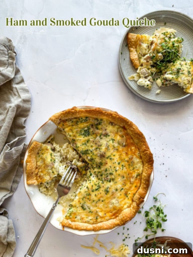 Savory Ham and Smoked Gouda Quiche 14 Hero shot of Ham and Smoked Gouda Quiche, golden and ready for a meal.