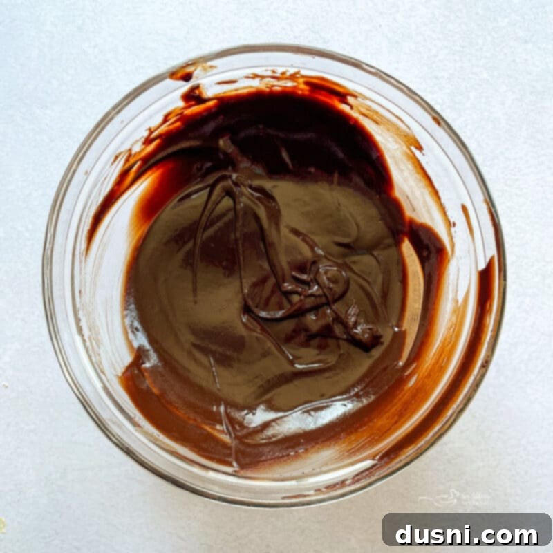 No-Bake Classic Nanaimo Bars 11 Nanaimo bar base with the custard filling spread evenly