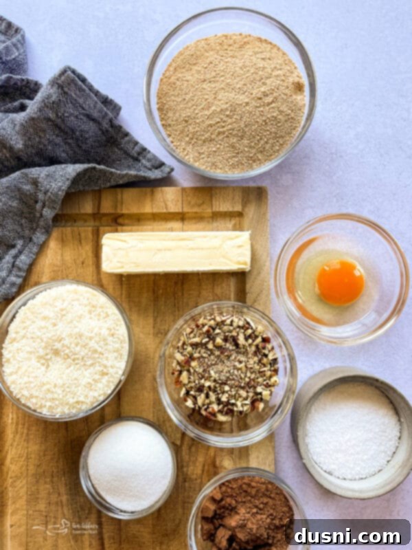 No-Bake Classic Nanaimo Bars 5 Ingredients for the Nanaimo bar bottom layer laid out on a table