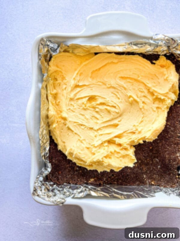 No-Bake Classic Nanaimo Bars 10 Nanaimo bar custard filling being mixed in a stand mixer