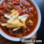 Close up of Three bean chili in a white bowl