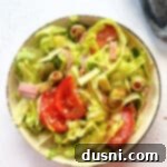 Columbia Restaurant's 1905 Salad 18 close up of Columbia 1905 Salad in a cream colored bowl.