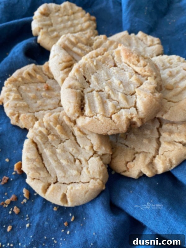 top view of soft and chewy homemade peanut butter cookies with fork marks