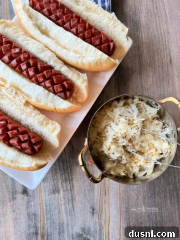 Smoky Franks with Tangy Kraut 14 Cooked smoked hot dogs in buns with kraut