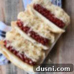 Smoky Franks with Tangy Kraut 23 Smoked Hot Dogs & Kraut in buns on a serving plate, ready to eat