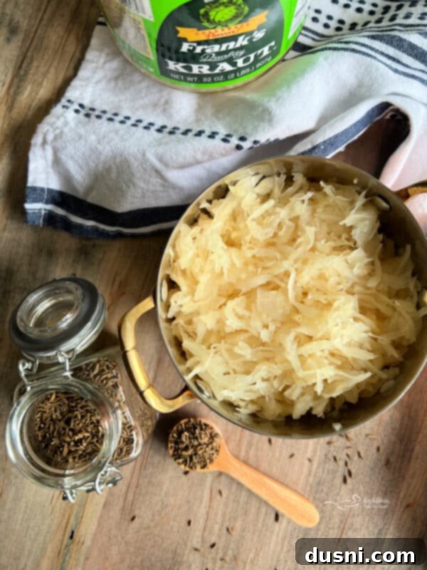 Smoky Franks with Tangy Kraut 7 Smoked hot dogs and sauerkraut in a serving dish