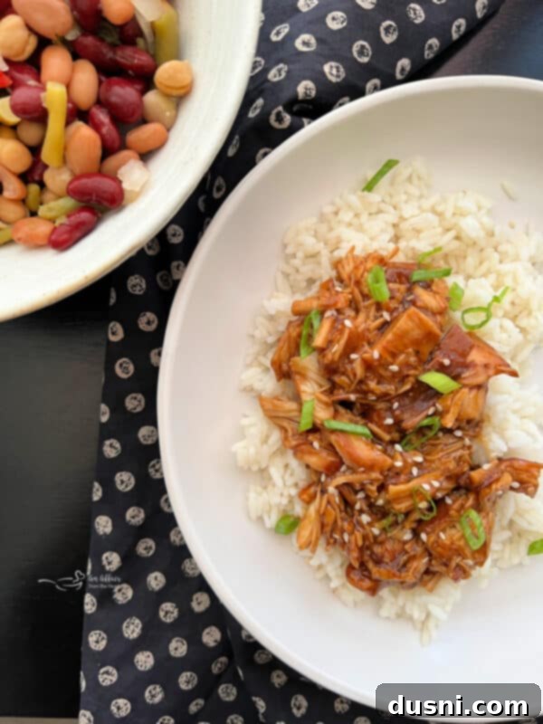 Slow Cooker Teriyaki Chicken plated with rice