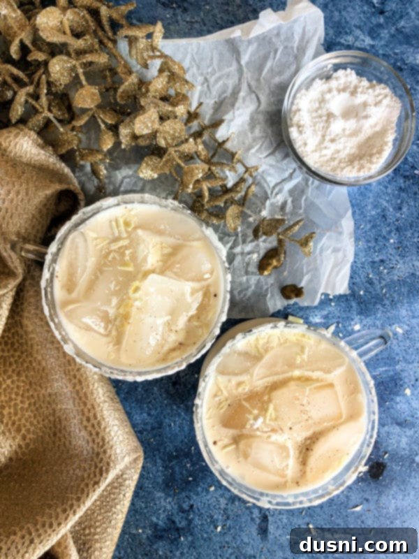 Creamy White Russian Bliss 13 White Russian Cocktail with gold decorations blue background