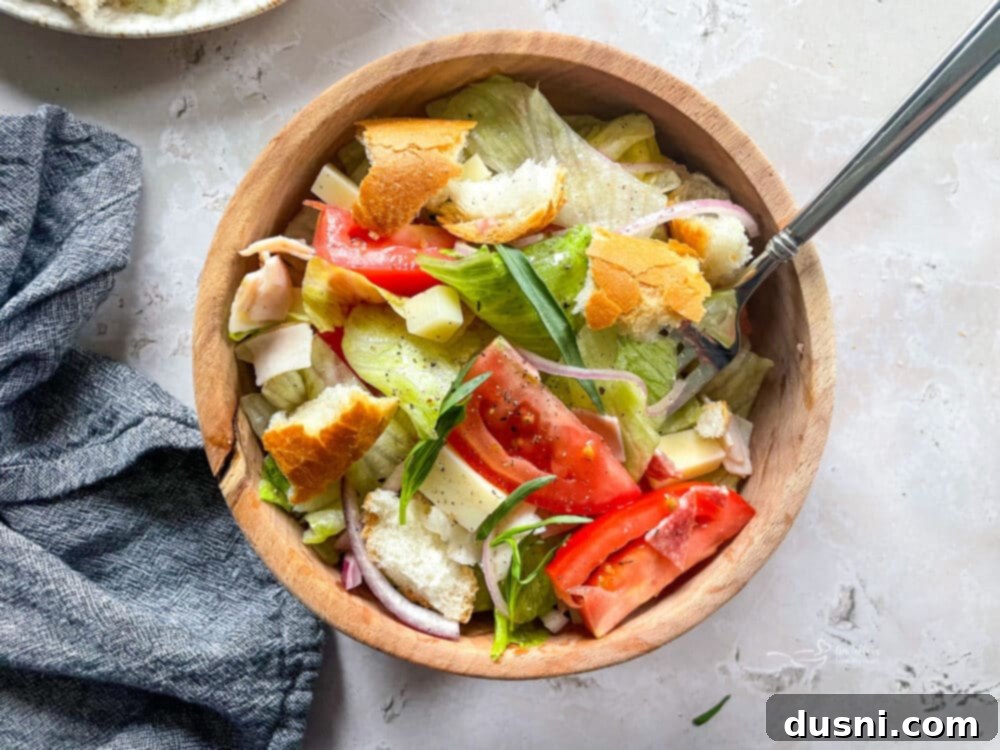 Prepared Little King Salad in a serving bowl, ready to be dressed.