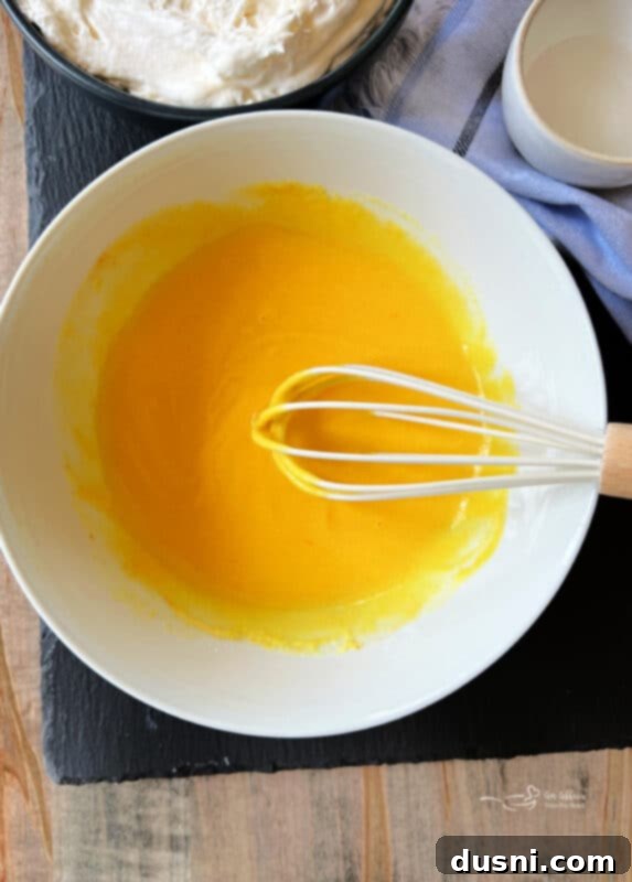 Step two: Whisking the vanilla pudding and milk together in a small bowl until smooth.