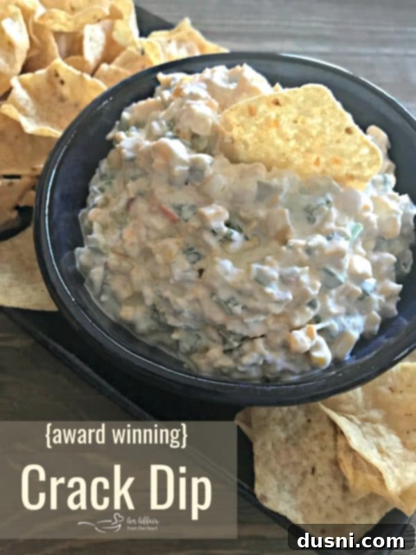 Award Winning Crack Dip in a serving bowl with chips